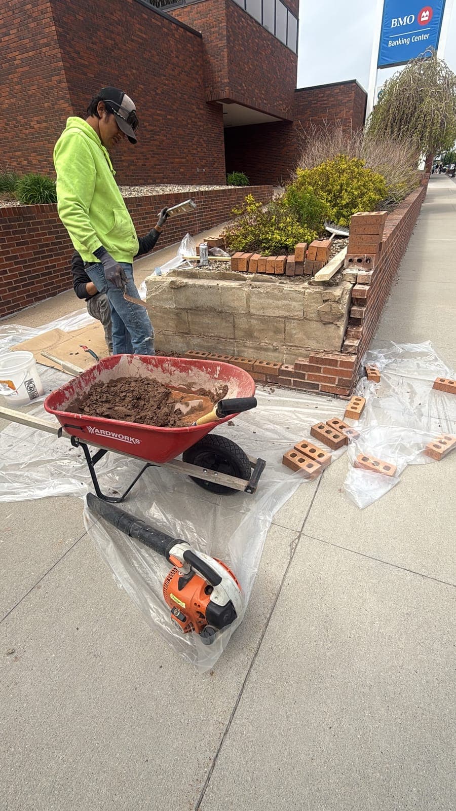 Completed brick planter along a downtown sidewalk